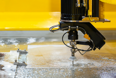 Waterjet cutting machine during the machining process